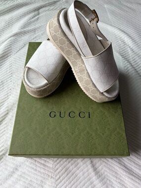 Gucci Angelina white GG canvas platform slide sandals with slingback strap